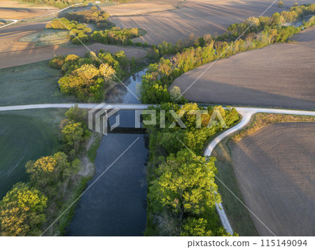 sunrise over farmland and the Lamine River at Roberts Bluff access in Missouri, springtime aerial view 115149094
