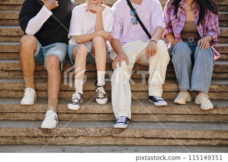 Close-up of Friends Feet on Stairs 115149351