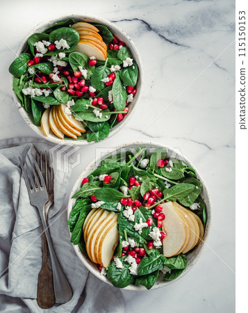 Vegan salad bowl with spinach, pear, pomegranate, cheese Vegan salad bowl with spinach, pear, pomegranate, cheese 115150153