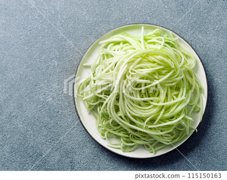 Zucchini noodles on plate. Top view, copy space Zucchini noodles on plate. Top view, copy space 115150163