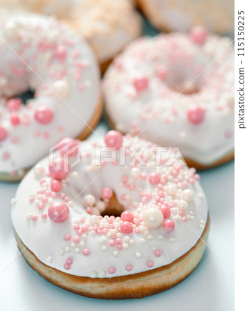 Romantic glazed donuts. white glaze, pink dressing 115150225