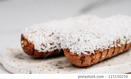 Healthy eclairs with coconut, copy space Healthy eclairs with coconut, copy space 115150250
