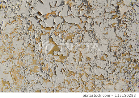 Dusty peeling paint wall background, texture of a concrete old wall with stains and cracks Dusty peeling paint wall background, texture of a concrete old wall with stains and cracks 115150288