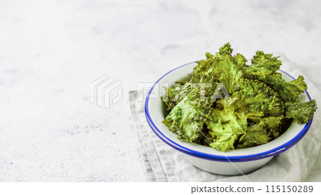 Homemade kale chips, copy space left Homemade kale chips, copy space left 115150289