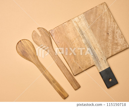 Empty wooden vintage fork and spoon with long handle Empty wooden vintage fork and spoon with long handle 115150718