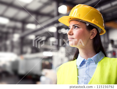 Manager woman in business casual clothes controlling goods in warehouse. 115150792