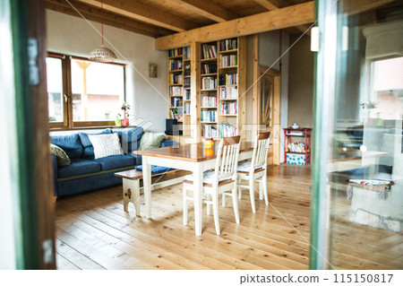 Interior of kitchen in vintage rustic style with wooden furniture in a cottage 115150817