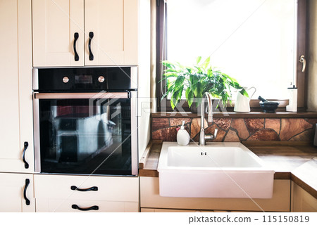 Interior of kitchen in vintage rustic style with wooden furniture in a cottage 115150819
