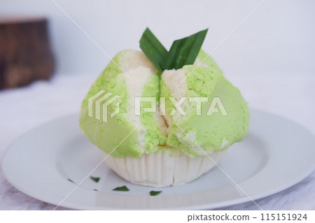 delicious pandan flavored cake as a background delicious pandan flavored cake as a background 115151924