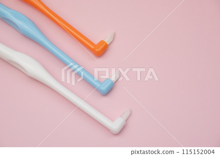 Tuft toothbrushes on pink, tufted tapered trim toothbrush, single compact interdental interspace brush for detail cleaning Tuft toothbrushes on pink, tufted tapered trim toothbrush, single compact interdental interspace brush for detail cleaning 115152004