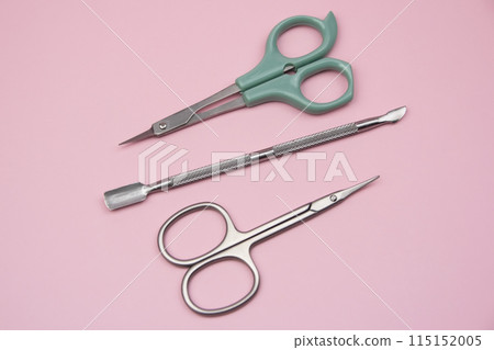 Manicure kit, professional grooming set, nail scissors with cuticle pusher, professional stainless steel pedicure manicure tools for fingernails and toenails on a dark background Manicure kit, professional grooming set, nail scissors with cuticle pusher, professional stainless steel pedicure manicure tools for fingernails and toenails on a dark background 115152005