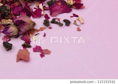 A captivating image featuring delicate dried rose petals arranged on a soft pink backdrop, with vibrant purple rose flowers in a close-up view, creating a romantic and enchanting floral texture. A captivating image featuring delicate dried rose petals arranged on a soft pink backdrop, with vibrant purple rose flowers in a close-up view, creating a romantic and enchanting floral texture. 115152542