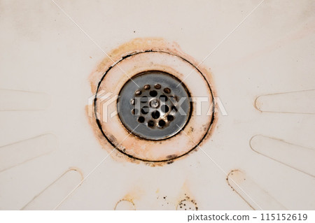 Dirty drain in the bathroom, cleaning service concept, old rusty shower drain Dirty drain in the bathroom, cleaning service concept, old rusty shower drain 115152619