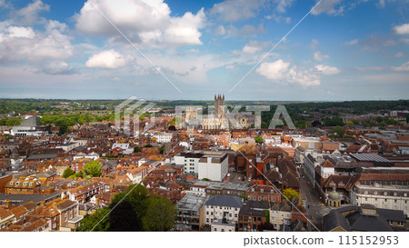 Flight over the city of Canterbury United Kingdom with famous Canterbury Cathedral on a sunny day - 115152953