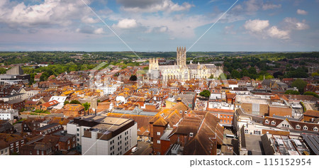 Flight over the city of Canterbury United Kingdom with famous Canterbury Cathedral on a sunny day - 115152954