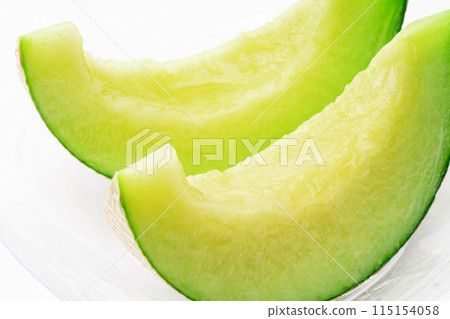 Close-up of cut melon on a plate Close-up of cut melon on a plate 115154058