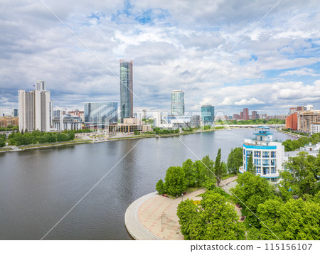 Yekaterinburg city with Buildings of Regional Government and Parliament, Dramatic Theatre, Iset Tower, Yeltsin Center, panoramic view at summer sunset. 115156107