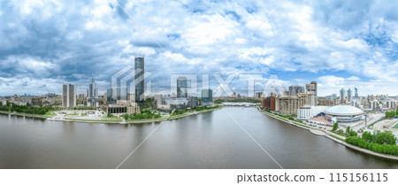 Yekaterinburg city with Buildings of Regional Government and Parliament, Dramatic Theatre, Iset Tower, Yeltsin Center, panoramic view at summer sunset. 115156115