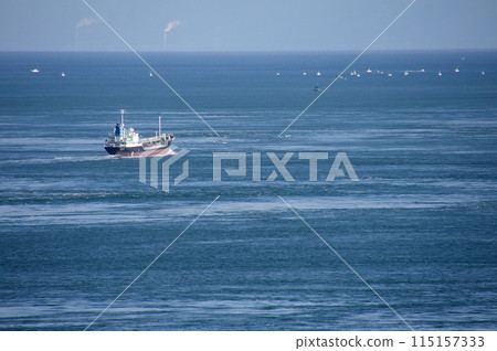 A cargo ship passing through the Kurushima Strait into the Hiuchi Nada Sea 115157333