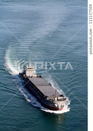 A pusher barge passing the Kurushima Kaikyo Bridge A pusher barge passing the Kurushima Kaikyo Bridge 115157509