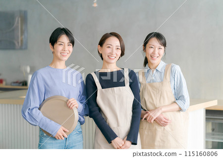 Women working in a cafe Women working in a cafe 115160806