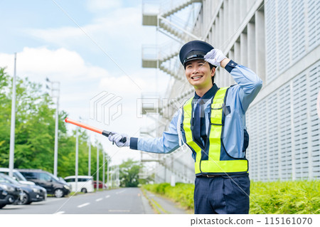 Security guard to guide traffic 115161070
