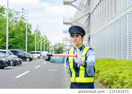 Security guard to guide traffic 115161071