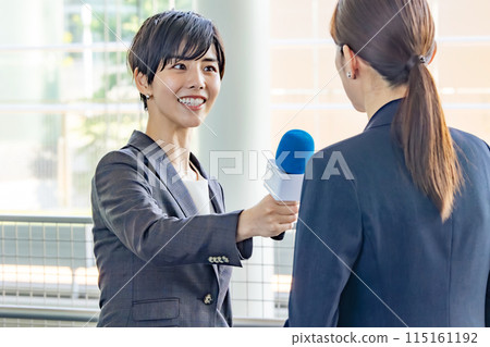 A woman interviewing 115161192