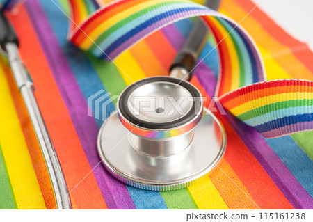 Stethoscope on rainbow flag background, symbol of LGBT pride month celebrate annual in June social, symbol of gay, lesbian, bisexual, transgender, human rights and peace. Stethoscope on rainbow flag background, symbol of LGBT pride month celebrate annual in June social, symbol of gay, lesbian, bisexual, transgender, human rights and peace. 115161238