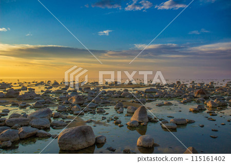 Beautiful landscape with stones in The Baltic Sea Beautiful landscape with stones in The Baltic Sea 115161402