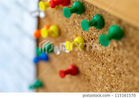 Cork board and push pin 115161570