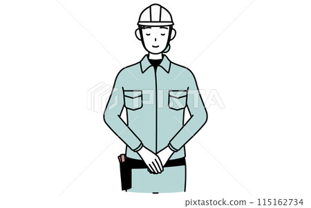 A female engineer in a helmet and work clothes bowing with folded hands 115162734