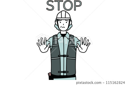 A senior female engineer in a helmet and work clothes sticking her hand out in front of her body to signal a stop A senior female engineer in a helmet and work clothes sticking her hand out in front of her body to signal a stop 115162824