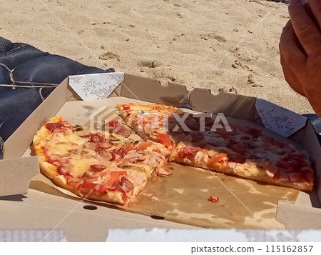 Ready pizza. Pizza with ham. Ready pizza. Pizza with ham. 115162857