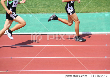 Junior high school students competing in a track and field meet Junior high school students competing in a track and field meet 115163557