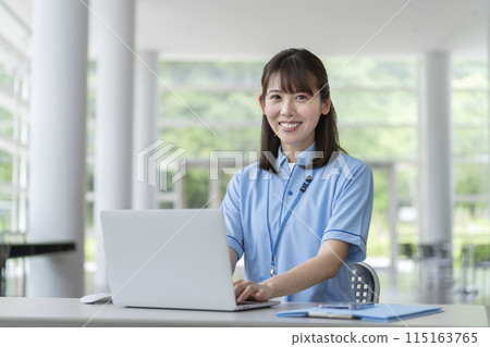 Image of a facility staff member working on a laptop Image of a facility staff member working on a laptop 115163765
