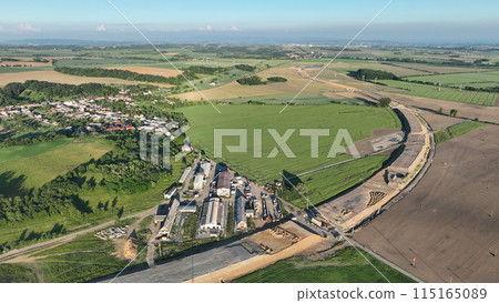 Drone aerial highway in construction Czech Prerov, destruction of agricultural land fields village, remove of people houses and buildings land grabbing extension works additional lanes way new road Drone aerial highway in construction Czech Prerov, destruction of agricultural land fields village, remove of people houses and buildings land grabbing extension works additional lanes way new road 115165089