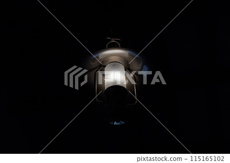 Lamps hanging from the ceiling 115165102