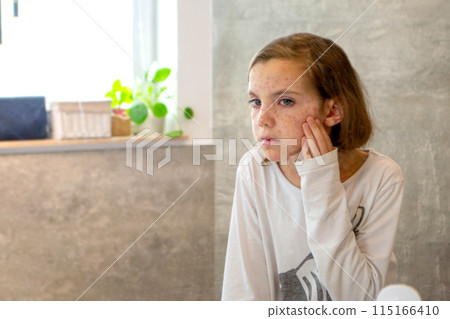 Natural vaccination. Contagious disease. Sick child with chickenpox. 115166410