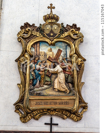 The intricate golden interior of the Carmelite church Igreja do Carmo in the old town of Faro in Portugal 115167043