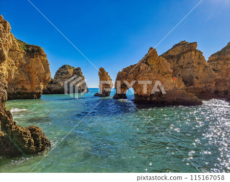 Ponta da Piedade is a unique rock formation with famous grottos in the ocean at Lagos, Algrave, Portugal 115167058