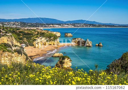 Ponta da Piedade is a unique rock formation with famous grottos in the ocean at Lagos, Algrave, Portugal 115167062