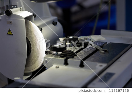 tool and cutter grinder sharpening machine closeup 115167126