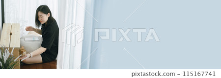 pet care concept with owner during read book and play with british cat in livingroom 115167741