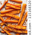 Baby carrots roasted 115168320