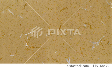A light-brown design of washi paper with gold and silver foil scattered like pine needles. A light-brown design of washi paper with gold and silver foil scattered like pine needles. 115168479