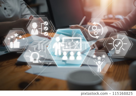 Coaching concept, Business team analyzing income charts and graphs on desk with Coaching icon on virtual screen. Coaching concept, Business team analyzing income charts and graphs on desk with Coaching icon on virtual screen. 115168825