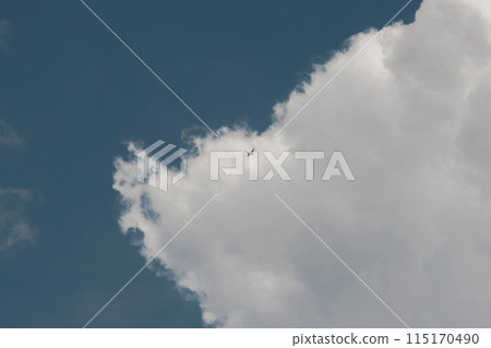 white thunderclouds in blue sky. summer cumulus clouds before rain. Beautiful view of nature 115170490