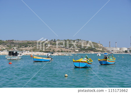 Colorful boats floating on the island Colorful boats floating on the island 115171662