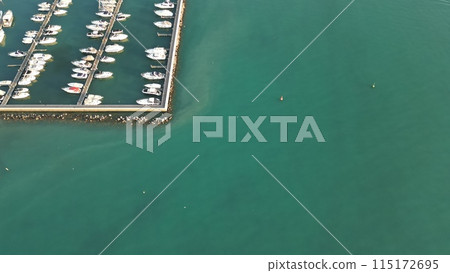 Boats and yachts in a bay on Lake Garda, Italy, Peschiera del Garda. Copy space 115172695